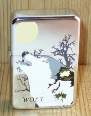 Aansteker " Huilende wolf " Zilverkleurig