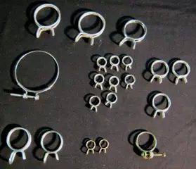 20 slang(draadveer)klemmen , diverse maten, staal, gst