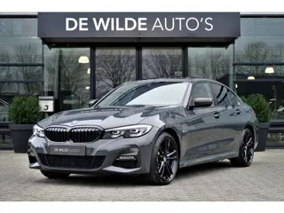 BMW 3-serie 320e M-sport Dravitgrijs Schuifdak Carbon 19-inch Camera Stoelverwarming