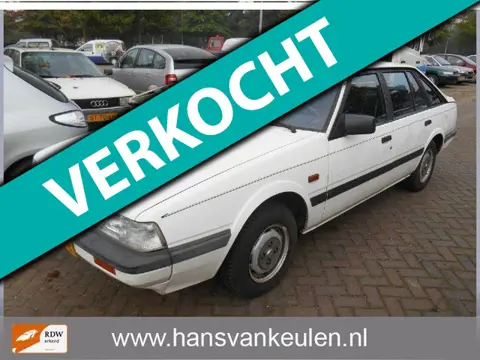 Mazda 626 1.6 LX 5drs opknapper oude foto,s staat al vele jaren stil