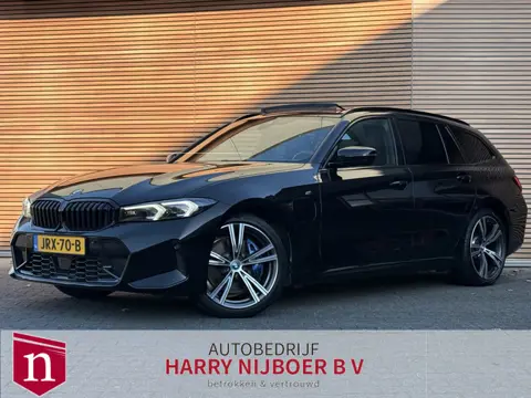 BMW 3 Serie Touring 330e Panoramadak / HUD / Leer / Stoelverwarming
