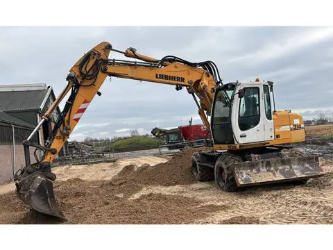 Liebherr 314 mobiele kraan graafmachine met aanbouwdelen