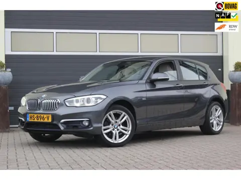 BMW 1-serie 118i Centennial High Executive | Leer | Camera |