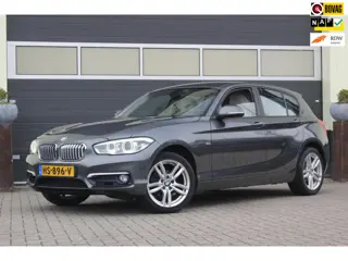 BMW 1-serie 118i Centennial High Executive | Leer | Camera |