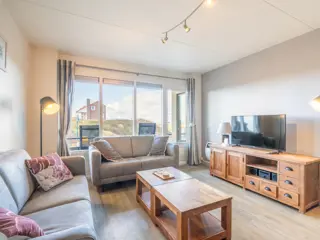 Appartement bij De Koog met uitzicht op duinen en Noordzee
