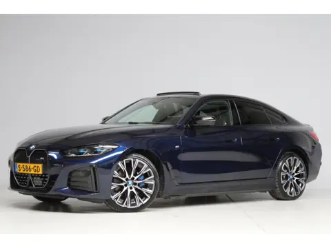 BMW I4 M50 M-sport | schuifkanteldak | adap. cruise | head-up | 360 camera | harmankardon | elek. tr