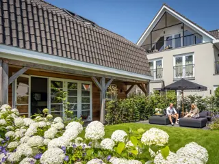 Luxe suite met veranda inclusief strandhuisje en ontbijtservice