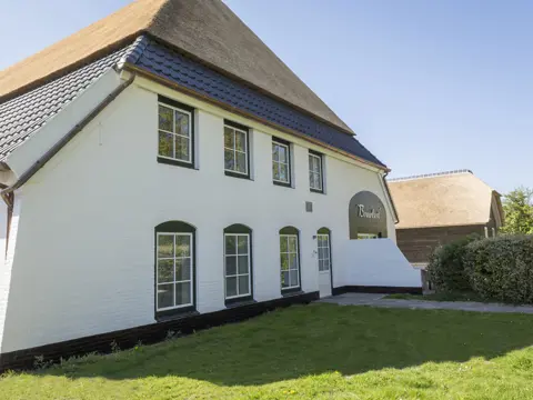 Luxe appartement nabij De Cocksdorp in sfeervolle boerderij
