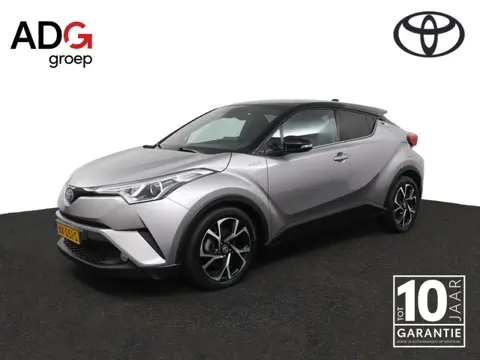 Toyota C-HR 1.8 Hybrid Bi-Tone | Stoelverwarming | Camera | Adaptieve Cruise Control | Lichtmetalen 