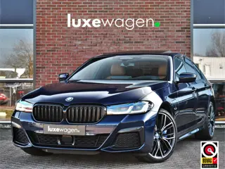 BMW 5 Serie 545e xDrive M-Sport Pano ACC HUD 20inch 360 Laser HiFi Adp-demping