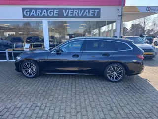 BMW 3 Serie Touring 330e High Executive (bj 2022)