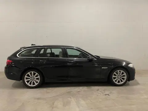 BMW 5-serie Touring 520d Luxury Edition Leer Navi Clima Cruise PDC