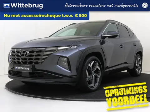 Hyundai Tucson 1.6 T-GDI HEV Premium Sky | Schuifdak | Carplay | Camera | Full Map Navigatie |