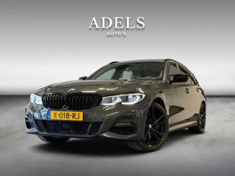 BMW 3 Serie Touring 330e xDrive High Executive M340i Diff Panodak Laserled Harman Kardon HUD ACC Dea