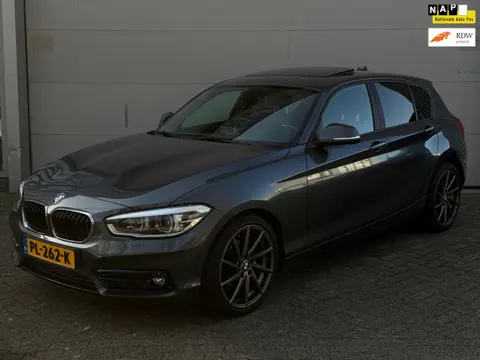 BMW 1-serie 118i Corporate Lease High Executive l Schuifdak l Leder l Navi Prof l Xenon l Winterset 