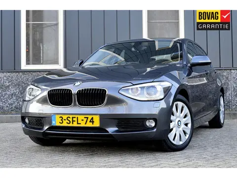 BMW 1-serie 118i Executive Rijklaarprijs-Garantie Xenon Navigatie Airco 1e Eigenaar