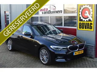BMW 3 Serie Touring 320e Business Edition Plus O.a: Pano, SOH 92%, Haak, Stoelverw, PDC, Carplay, Na