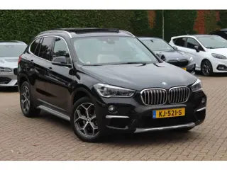 BMW X1 sDrive18i Centennial High Exe. 107.983 km! / Panoramadak / Head-up / Leder / 18'' / Keyless /