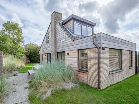 Vrijstaand, warm ingericht vakantiehuis aan de rand van Villapark Residentie Texel