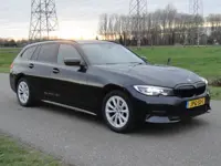 BMW 3-serie Touring 318d High Executive Full LED I ECC I LEER I NAVIG
