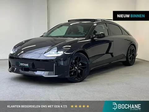 Hyundai IONIQ 6 First Edition AWD 77.4 kWh | 100% SOH | TREKHAAK | PANO | 360º CAMERA | HEAD-UP |