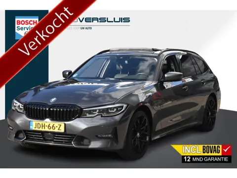 BMW 3 Serie Touring 330e High Executive Schuifdak | Stuur/Stoelverwarming | BSM | ACC | 12 mnd BOVAG