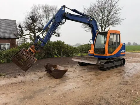 Kato HD 307 Graafmachine