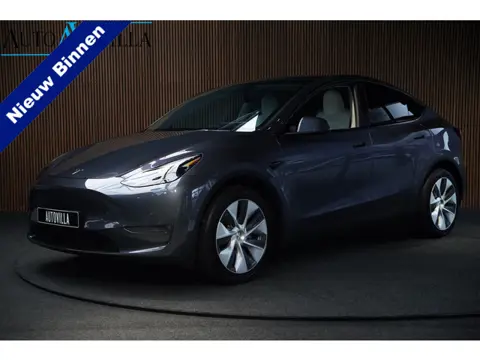 Tesla Model Y Long Range Dual Motor AWD 514pk Afn. trekhaak Navi Camera Leer Warmtepomp ACC Autopilo