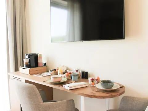 Kamer met uitzicht op de tuin en het Eierlandse platteland