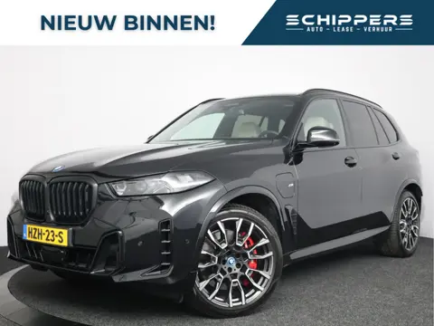 BMW X5 xDrive50e | M-Sport Pro | Trekhaak | Panoramadak | Individual bekleding |