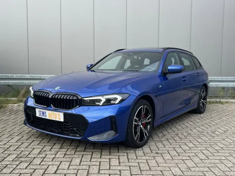 BMW 3 Serie Touring 330e xDrive M-Sport Pano / Trekhaak / Sfeerverlichting