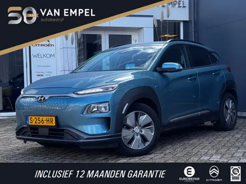 Hyundai Kona EV Comfort 64 kWh | 95% SOH | Trekhaak | Camera | Navigatie | Stoelverwarming |