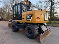 Caterpillar M313D (bj 2012)