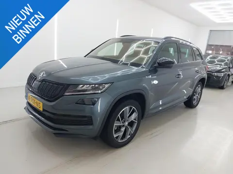 SKODA KODIAQ 1.5 TSI SPORTLINE BUSINESS I AUTOMAAT I TREKHAAK I P-CAMERA I STOELVERWARMING