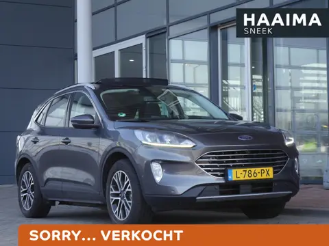 Ford Kuga 2.5 PHEV Titanium | Plug in hybride | Elektrisch glazen panorama-dak | Trekhaak | Navigati