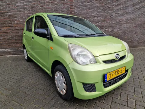 Daihatsu Cuore 1.0 Trend radio cd APK 03-27 dealer onderhouden