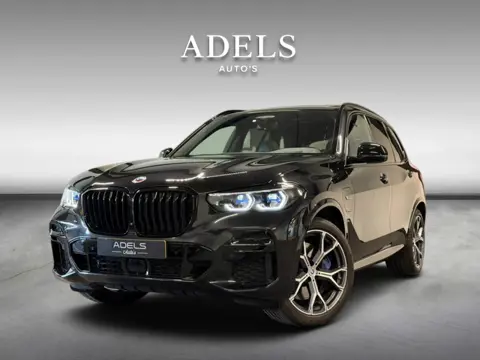 BMW X5 xDrive45e High Executive M Sport Panodak Skylounge HUD M Stoelen Trekhaak ACC Laserled Origin