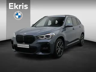 BMW X1 sDrive20i High Executive | M Sportpakket | Parking Pack | Trekhaak | Panoramadak | Laserlicht
