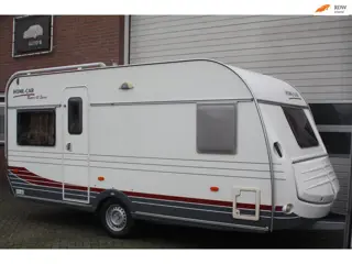 Home-car racer 45 space Garantie, 4 persoons, frans bed, fietsen drager, kachel, voortent, vast toil