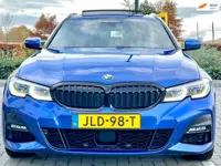 BMW 3-serie Touring 330e xDrive M PAKKET/HUD/LASER/PANO 2021 RIJK UITGERUST