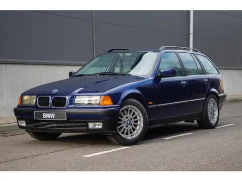 BMW 3-serie Touring 328i Executive | 200.000KM | Gedocumenteerd | Leer | Climate Control | Style 32
