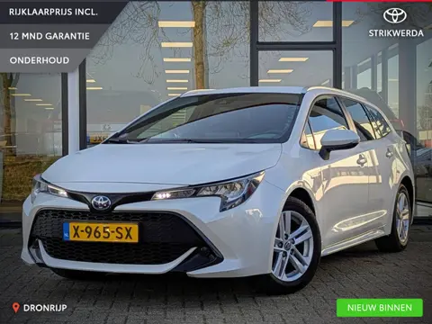Toyota Corolla Touring Sports 1.8 Hybrid Active Plus | Stoel- stuurverwarming | Trekhaak | Parelmoer