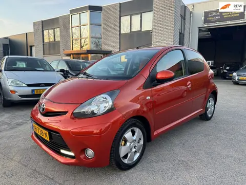 Toyota Aygo 1.0 VVT-i Dynamic Orange Airco Navi Led