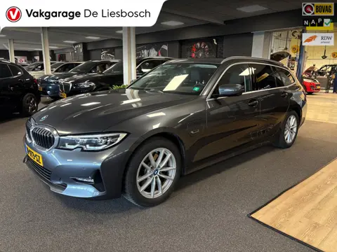 BMW 3-serie Touring 320e Business Edition Plus,leer,navi,trekhaak,orig ned ,dealer onderhouden