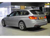 BMW 3-serie Touring 320i High Executive M-SPORT