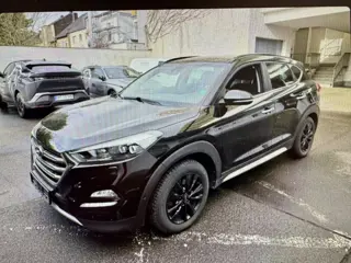 Hyundai Tucson 1.6 T-GDi Premium 4WD | Pano | Leer | Automaat | geleverd met 19" LM Origineel | % Bo