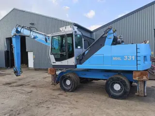 Fuchs MHL 331 overslagkraan umslagbagger waste handler