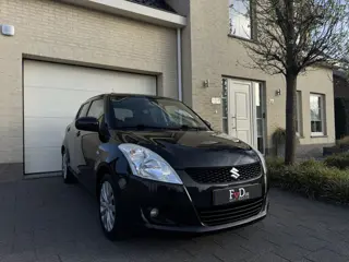 Suzuki Swift 1.2 Exclusive Schuifdak Navi Keyless Stoelverwarming Clima CruiseControl