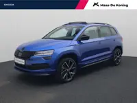 Skoda Karoq 1.5TSI/150PK Sportline Business DSG · Panoramadak · Camera · Trekhaak · Apple/Android
