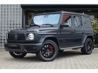 Mercedes-Benz G-Klasse 63 AMG | Carbon int., Massage, Pano, Rij-ass. Pakket, Burmester, Trekhaak, Zi